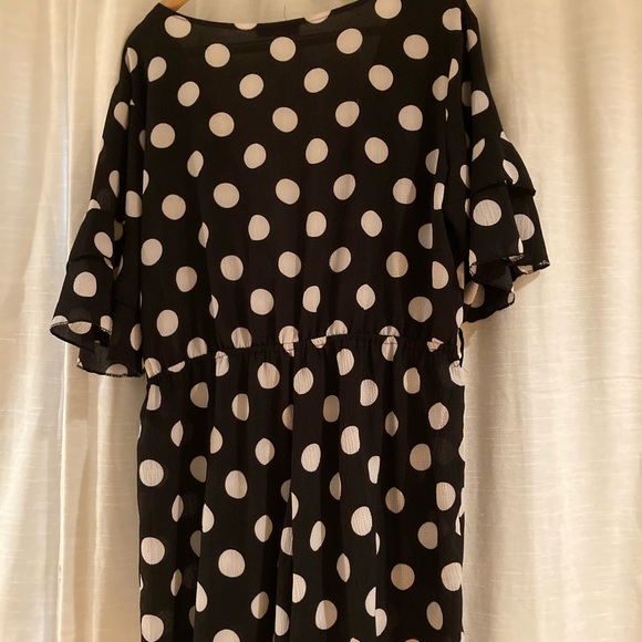 Black w/ White Polka dot Romper. Ruffle Sleeves. - Picture 2 of 2
